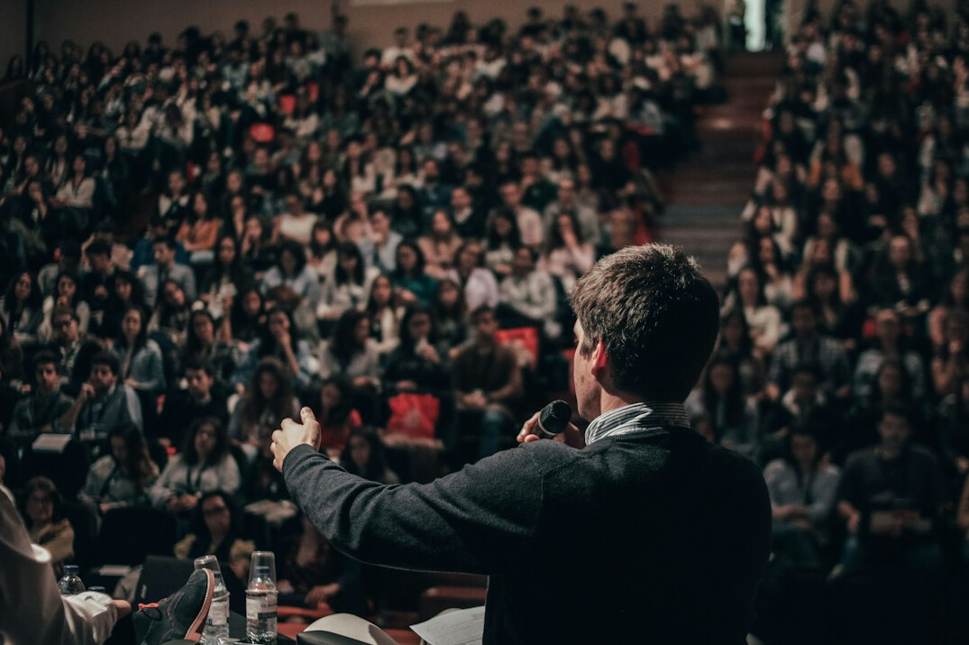 confident speaker presenting ideas