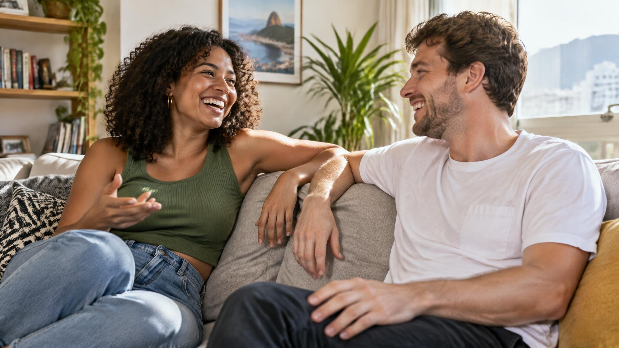 Friends chatting and laughing together indoors