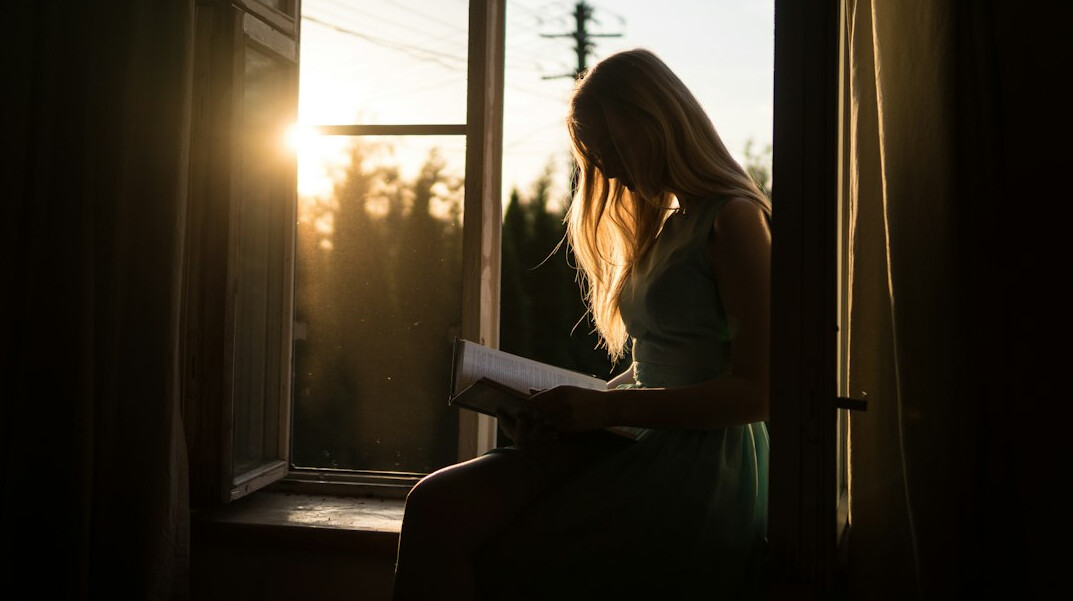 woman reading book